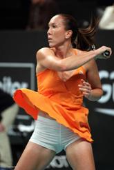 Jelena Jankovic at Open GDF SUEZ in orange ANTA dress
