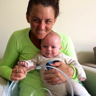Casey Dellacqua with her baby