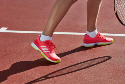 Adidas Adizero Ubersonic 2 women's tennis shoes on court