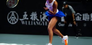 Naomi Osaka of Japan in action during her RR1 match 2019 WTA Finals tennis tournament