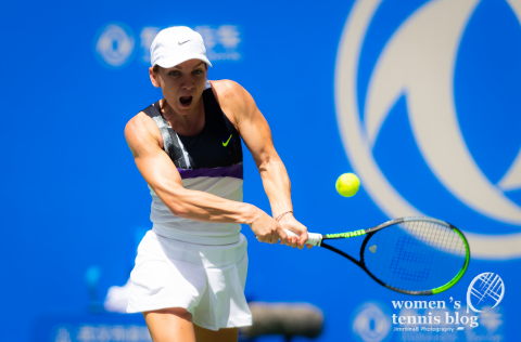 Simona Halep of Romania in action during her first-round match the 2019 Dongfeng Motor Wuhan Open Premier 5 tennis tournament