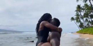 Sloane Stephens and Jozy Altidore hugging on the beach