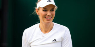 Caroline Wozniacki of Denmark in action during the legends competition at the 2023 Wimbledon Championships Grand Slam tennis tournament