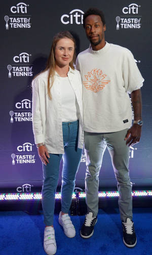Elina Svitolina and Gael Monfils pose for photographers at the Citi Taste of Tennis in Washington D.C.