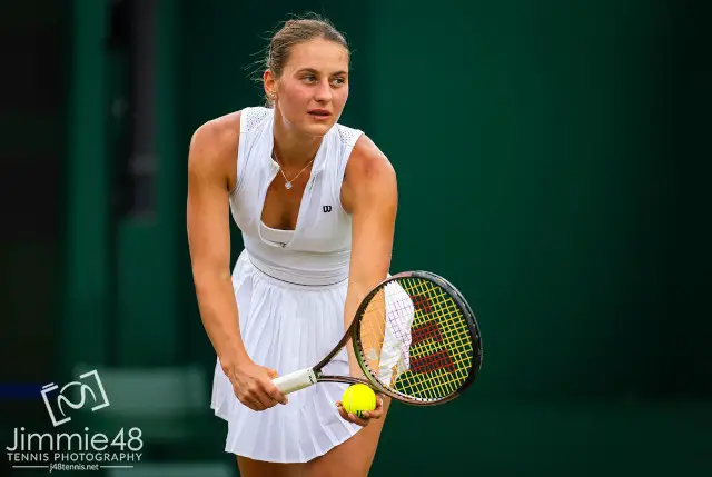Marta Kostyuk in Wilson dress at Wimbledon 2023