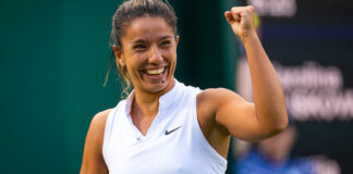 Natalija Stevanovic smiles and fistpumps at Wimbledon 2023