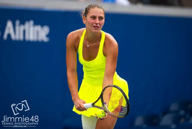 Marta Kostyuk in yellow Wilson tennis dress at the 2023 US Open
