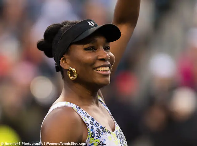 Venus Williams waves to the crowd at the BNP Paribas Open