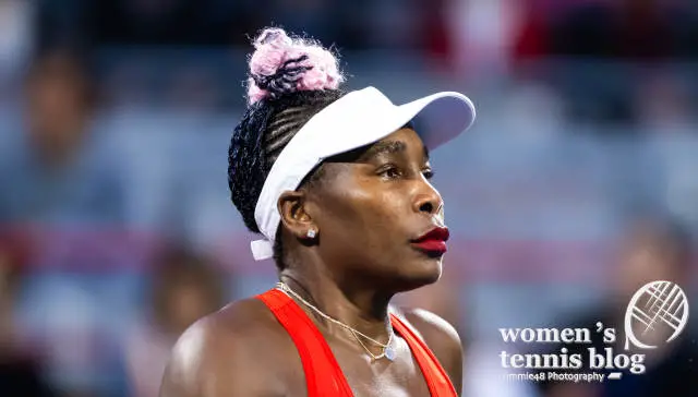 Venus Williams wears red lipstick during a tennis match in Montreal