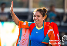 Simona Halep waves to the Miami crowd with a smile on her face