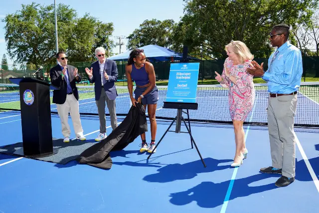 Coco Gauff unveils courts that have been refurbished as part of the US Open Legacy Initiative at Pompey Park in Delray Beach, Florida.