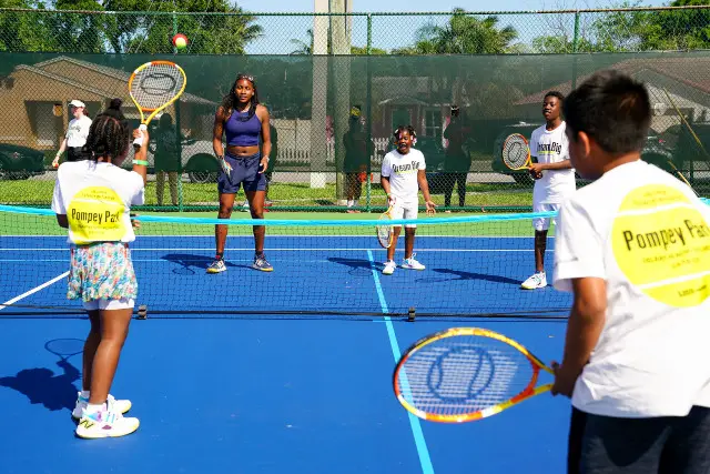 Kids from the Delray Beach Youth Tennis Foundation take part in a clinic with Coco Gauff at refurbished courts as part of the US Open Legacy Initiative at Pompey Park in Delray Beach, Florida.