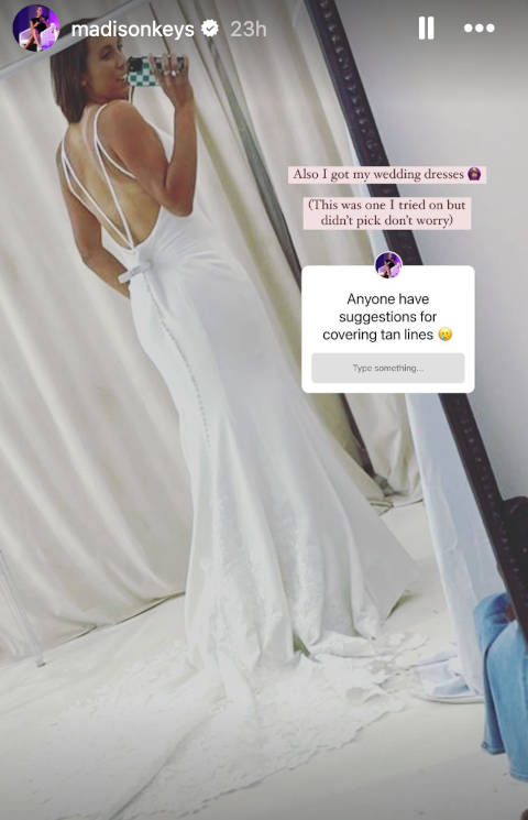 Madison Keys tries on a wedding dress