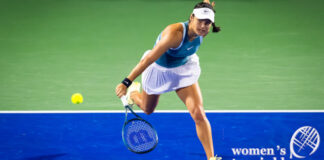 Emma Raducanu playing at the Dubai tournament