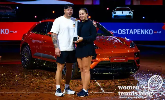 Jelena Ostapenko poses with boyfriend in front of her new Porsche