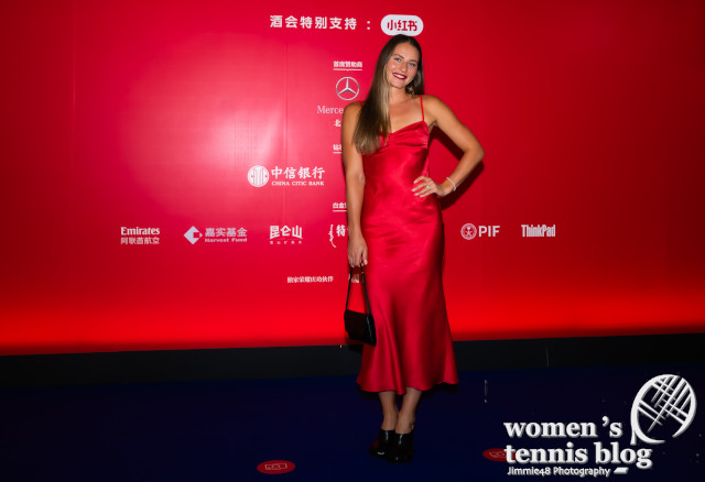 Marta Kostyuk in red satin dress at the Beijing players' party