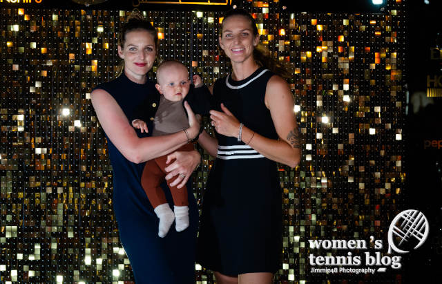 Kristyna Pliskova with her twin sister Karolina and son Adam at the 2023 Dubai Duty Free Tennis Championships